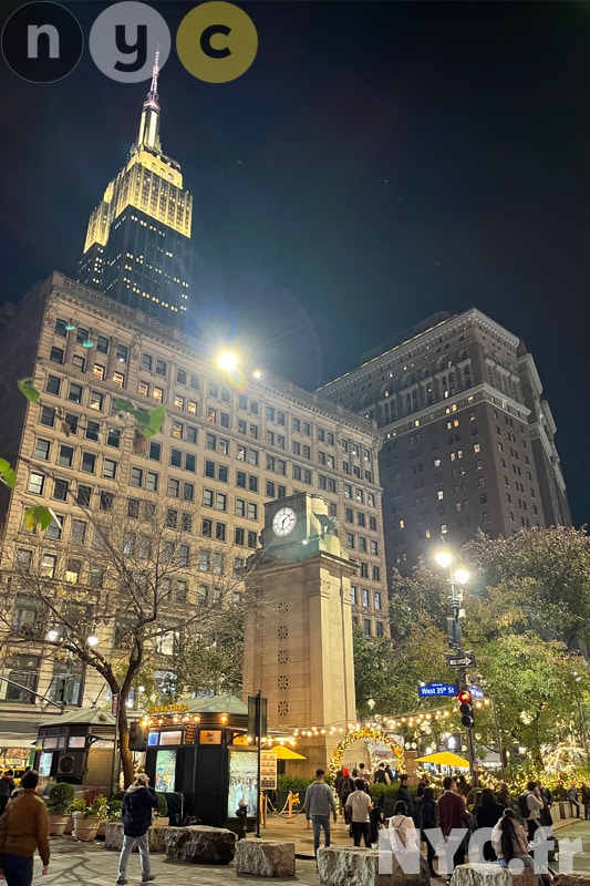 Herald Square Markets avec l'Empie State Building en arrière plan